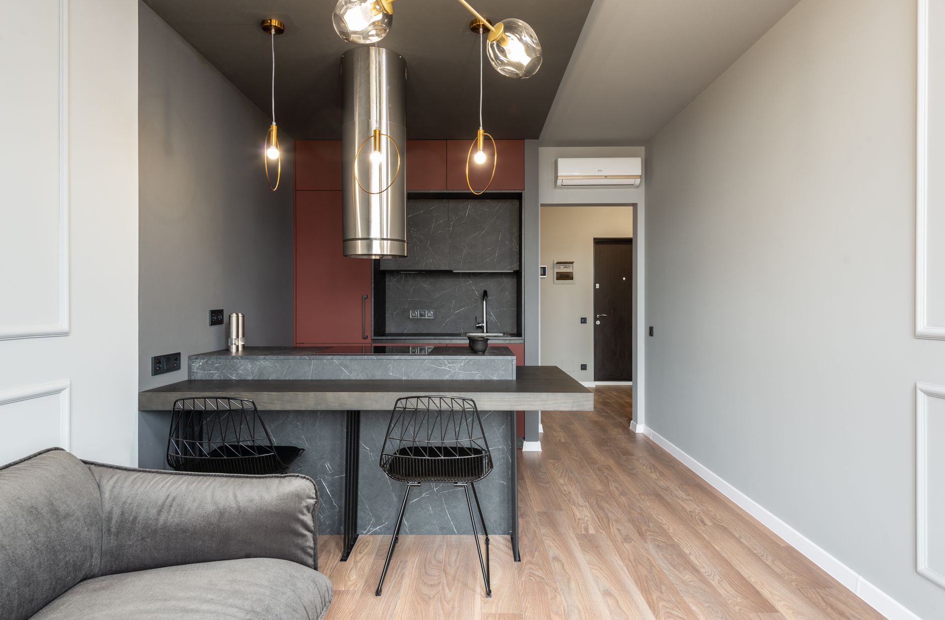 Contemporary interior design of modern apartment with open space kitchen with island countertop under